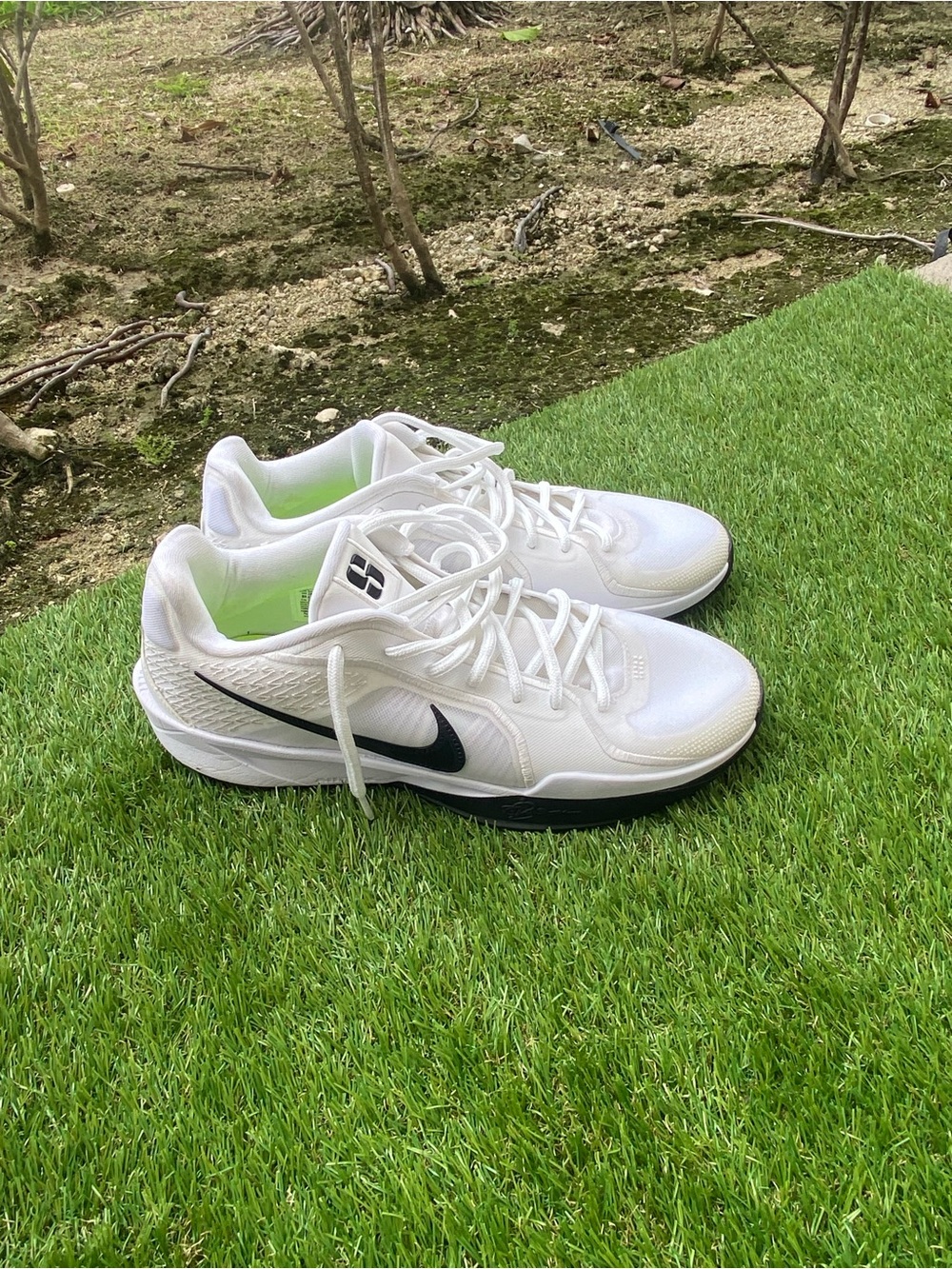Nike Women’s White Athletic Sneakers with Black Swoosh